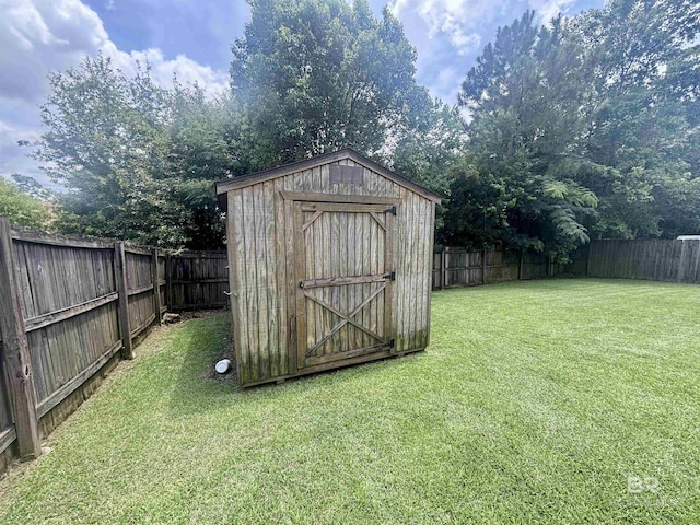 8185 Savage Loop, Theodore, AL 36582 - view of shed with a fenced backyard