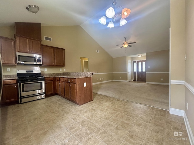 8185 Savage Loop, Theodore, AL 36582 - kitchen featuring stainless steel appliances, a peninsula, ceiling fan, a chandelier, and open floor plan