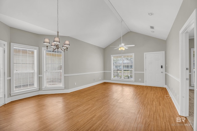 3 Cottage Dr, Fairhope, AL 36532 - unfurnished room with a chandelier, light wood-type flooring, vaulted ceiling, baseboards, and a ceiling fan