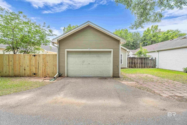 3 Cottage Dr, Fairhope, AL 36532 - detached garage featuring fence and driveway