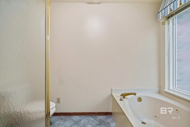 3761 Winford Rd, Mobile, AL 36619 - full bath featuring a bath, baseboards, toilet, and tile patterned flooring