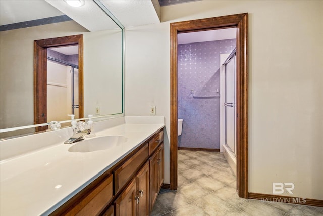 3761 Winford Rd, Mobile, AL 36619 - full bath with a stall shower, baseboards, and vanity