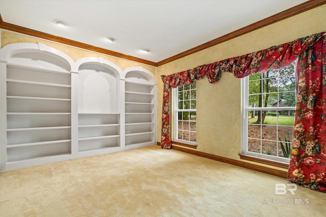 3761 Winford Rd, Mobile, AL 36619 - unfurnished room with carpet flooring, built in shelves, and crown molding