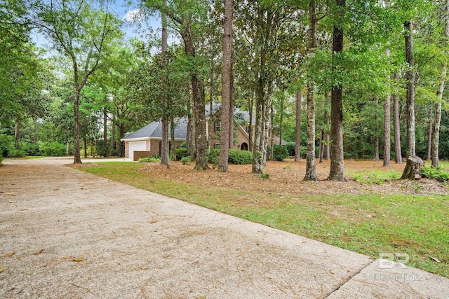 3761 Winford Rd, Mobile, AL 36619 - view of yard with driveway and an attached garage
