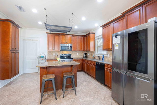 8856 Asphodel Ln, Daphne, AL 36526 - kitchen with stainless steel appliances, crown molding, light stone countertops, light tile patterned flooring, and backsplash