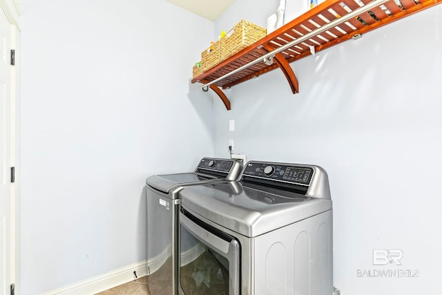 washroom with washer and clothes dryer