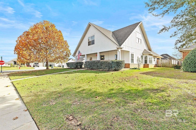 view of home's exterior with a lawn