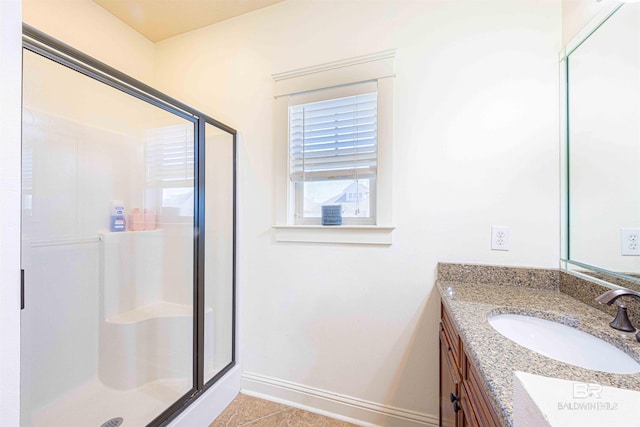 8856 Asphodel Ln, Daphne, AL 36526 - bathroom with a stall shower, vanity, and tile patterned flooring