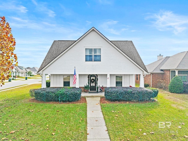 view of front of home with a front lawn