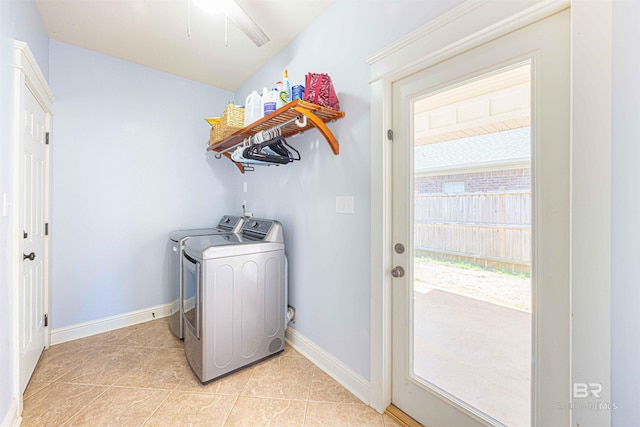 8856 Asphodel Ln, Daphne, AL 36526 - laundry area featuring washer and dryer, light tile patterned floors, and ceiling fan
