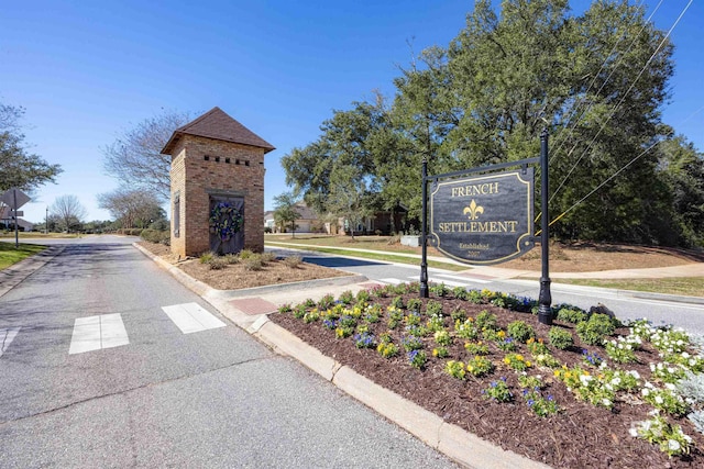 8856 Asphodel Ln, Daphne, AL 36526 - view of asphalt road with curbs and traffic signs