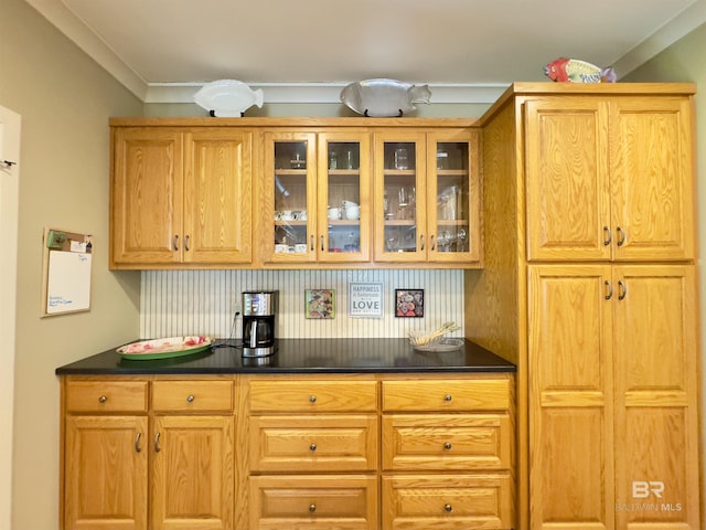 51600 State Highway 59, Bay Minette, AL 36507 - kitchen with dark countertops, glass insert cabinets, tasteful backsplash, and crown molding