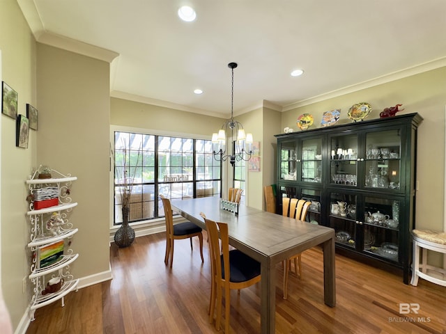 51600 State Highway 59, Bay Minette, AL 36507 - dining area featuring dark wood finished floors, crown molding, recessed lighting, a chandelier, and baseboards