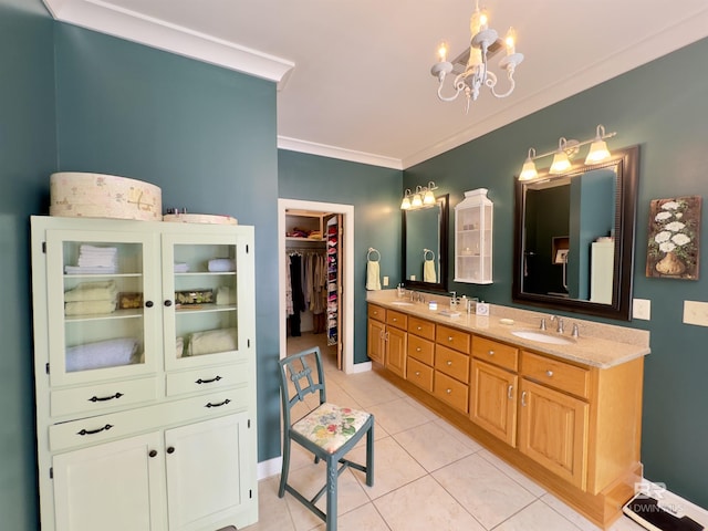 51600 State Highway 59, Bay Minette, AL 36507 - bathroom featuring a chandelier, tile patterned floors, double vanity, ornamental molding, and a spacious closet