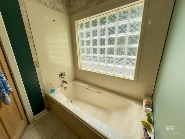 51600 State Highway 59, Bay Minette, AL 36507 - full bathroom featuring a bath and tile patterned flooring