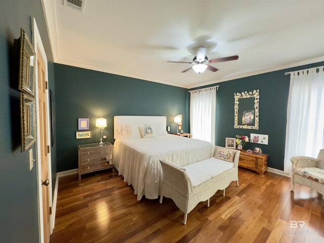 51600 State Highway 59, Bay Minette, AL 36507 - bedroom with wood finished floors, ornamental molding, baseboards, and a ceiling fan