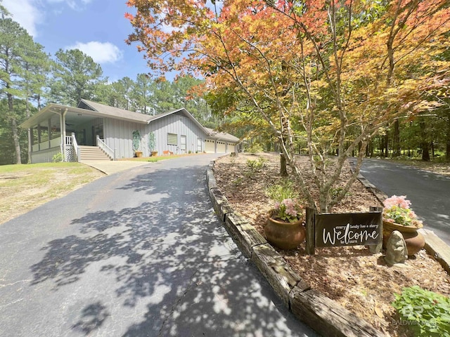 51600 State Highway 59, Bay Minette, AL 36507 - view of front of property featuring asphalt driveway, board and batten siding, and covered porch