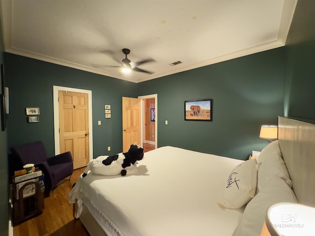 51600 State Highway 59, Bay Minette, AL 36507 - bedroom with wood finished floors, crown molding, and ceiling fan
