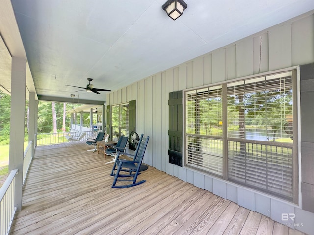 51600 State Highway 59, Bay Minette, AL 36507 - wooden porch with ceiling fan and a water view