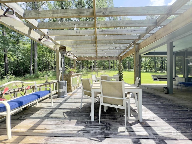 51600 State Highway 59, Bay Minette, AL 36507 - wooden terrace with outdoor dining space, a pergola, and a lawn