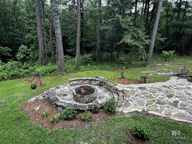51600 State Highway 59, Bay Minette, AL 36507 - view of grassy yard featuring an outdoor fire pit and a patio area