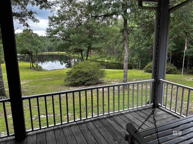 51600 State Highway 59, Bay Minette, AL 36507 - wooden terrace featuring a water view and a lawn
