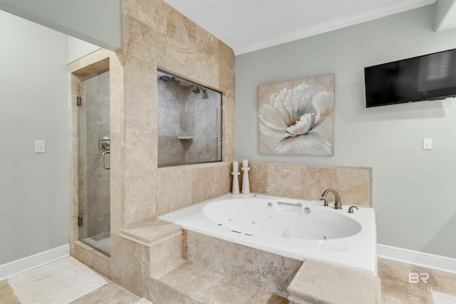 607 Wedgewood Dr, Gulf Shores, AL 36542 - full bath featuring a shower stall, a jetted tub, crown molding, and baseboards