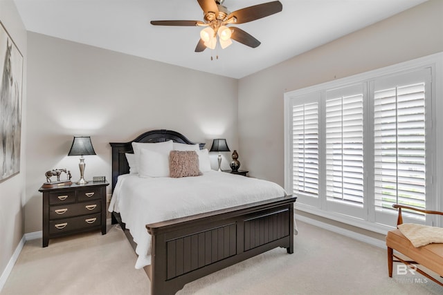 607 Wedgewood Dr, Gulf Shores, AL 36542 - bedroom featuring light carpet, baseboards, and a ceiling fan