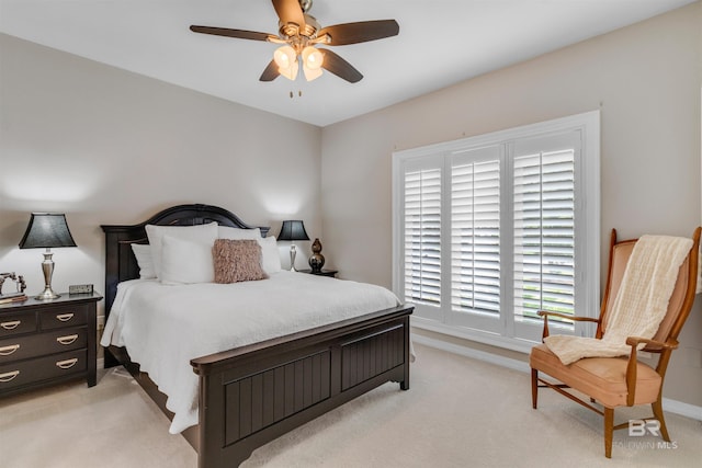 607 Wedgewood Dr, Gulf Shores, AL 36542 - bedroom with light colored carpet, baseboards, and a ceiling fan
