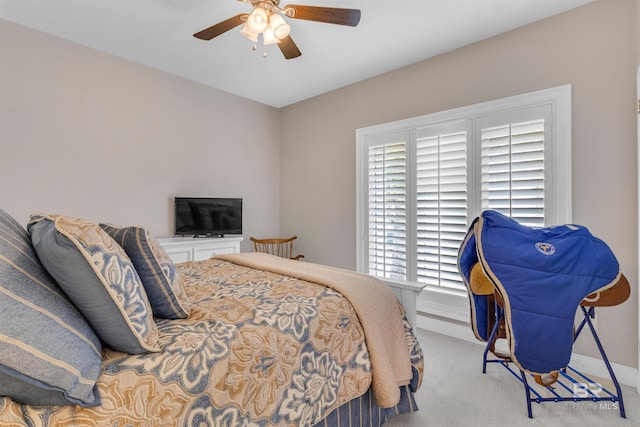 607 Wedgewood Dr, Gulf Shores, AL 36542 - bedroom featuring carpet floors, a ceiling fan, and baseboards