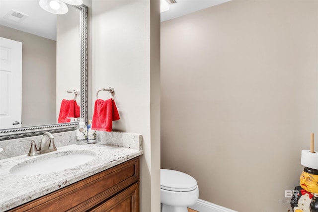 607 Wedgewood Dr, Gulf Shores, AL 36542 - bathroom featuring toilet and vanity