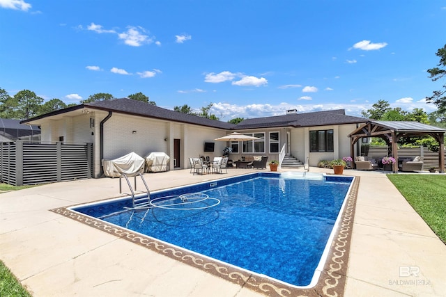 607 Wedgewood Dr, Gulf Shores, AL 36542 - outdoor pool with outdoor lounge area, entry steps, a gazebo, and a patio