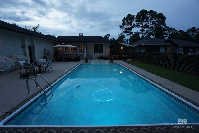 607 Wedgewood Dr, Gulf Shores, AL 36542 - view of swimming pool featuring a patio and a fenced backyard