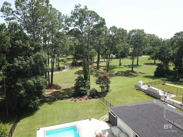 607 Wedgewood Dr, Gulf Shores, AL 36542 - drone / aerial view of a pool and a tree filled landscape