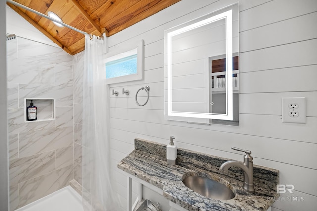 bathroom featuring wood ceiling, curtained shower, and wood walls