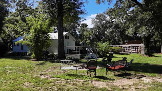 view of yard with a deck