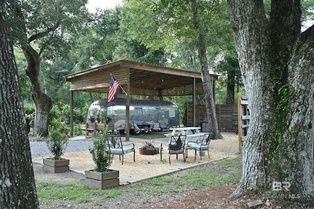 view of home's community featuring a fire pit