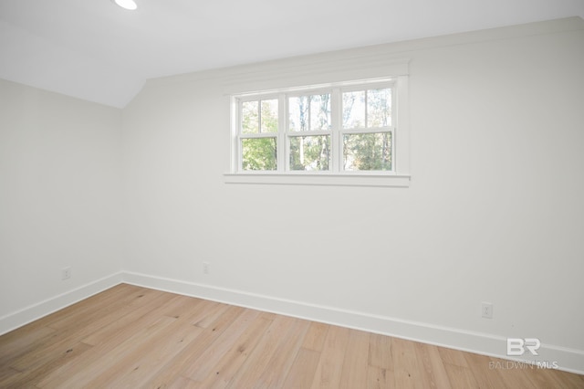 unfurnished room with light wood-type flooring