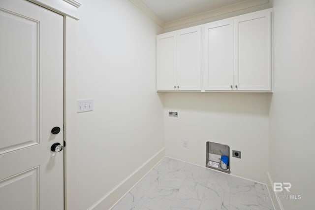 laundry room featuring cabinets, hookup for a washing machine, ornamental molding, and hookup for an electric dryer