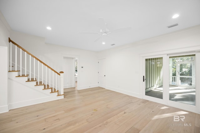 interior space featuring ceiling fan and light hardwood / wood-style floors