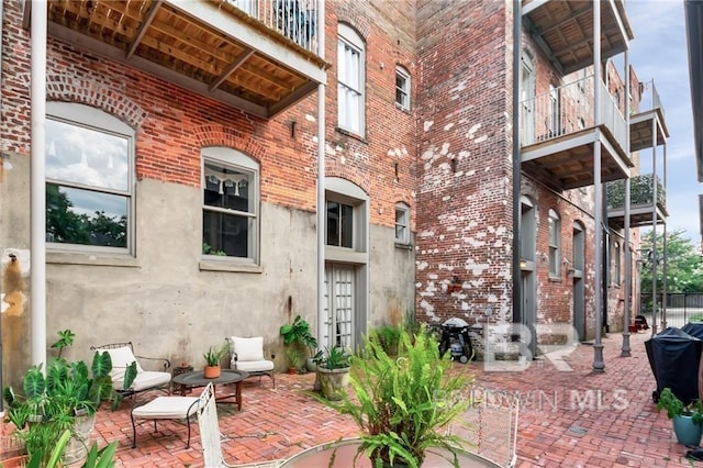 property entrance with a patio