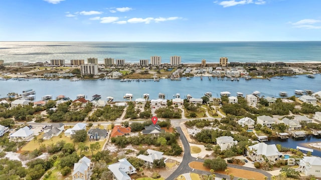 birds eye view of property featuring a water view