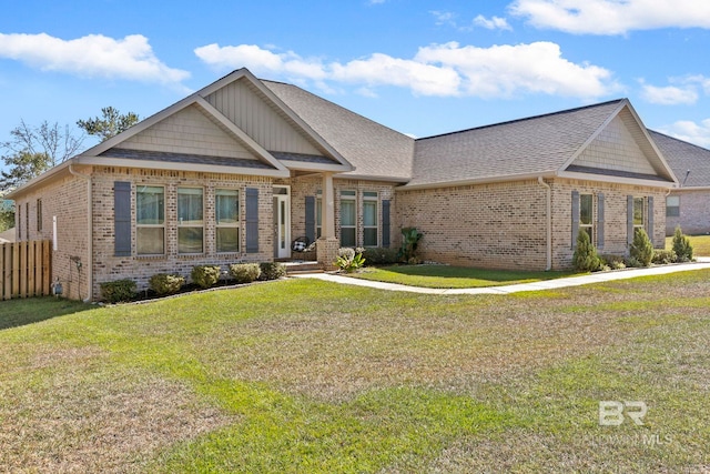 craftsman-style home with a front lawn