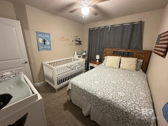 carpeted bedroom with ceiling fan