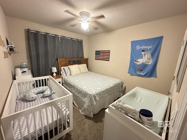 carpeted bedroom featuring ceiling fan