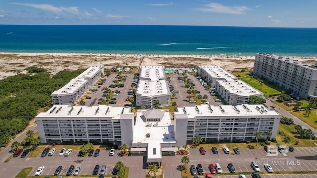 aerial view featuring a water view and a view of the beach