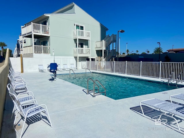 view of pool with a patio area