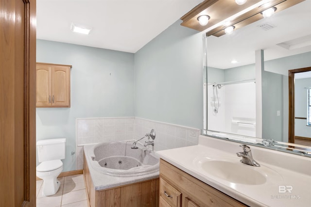 bathroom with tile patterned flooring, vanity, a shower, toilet, and a jetted tub