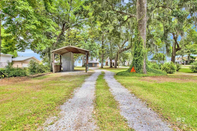 view of road featuring driveway