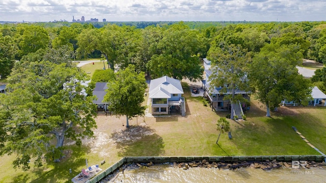 bird's eye view with a water view and a view of trees